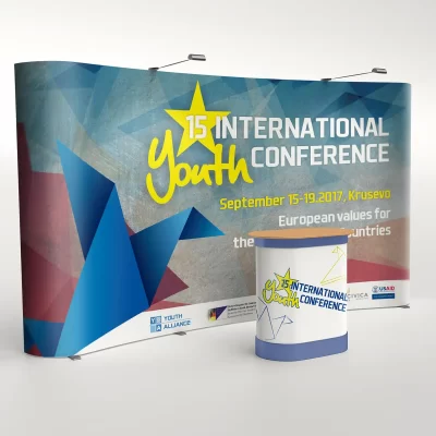 Promotional material for the 15th International Youth Conference with abstract design.