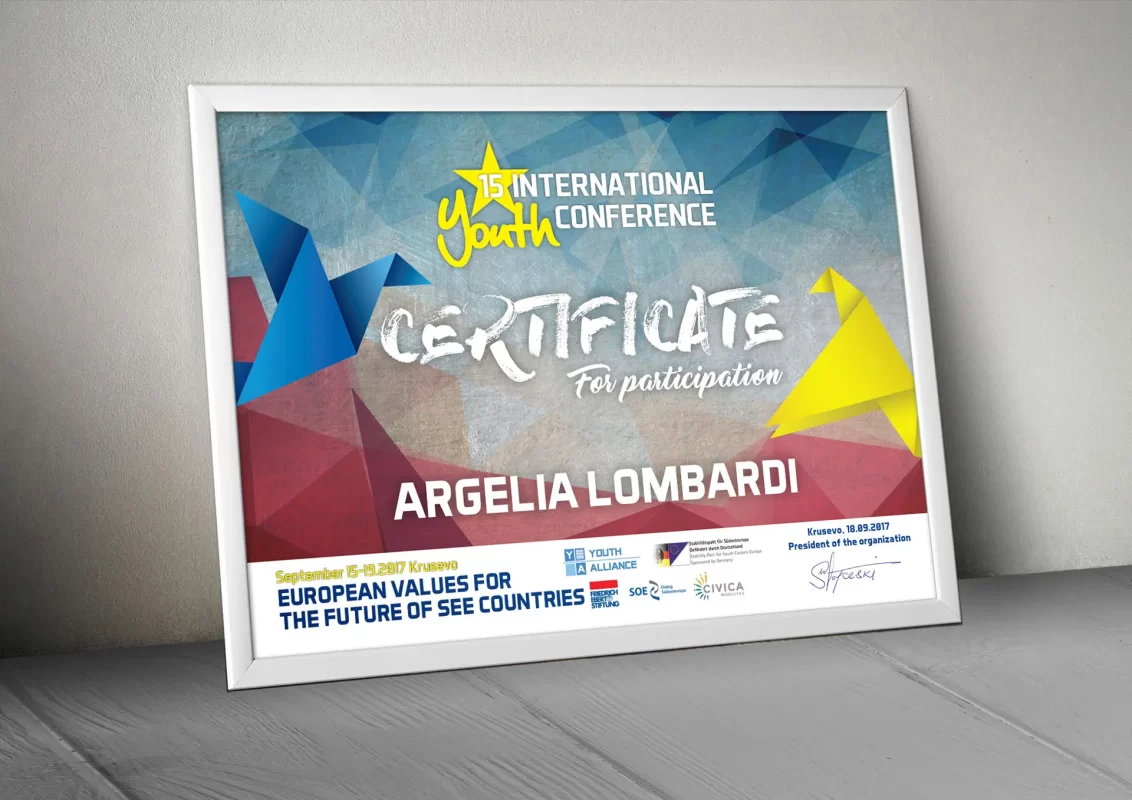 Framed participation certificate for a youth conference with colorful geometric background.