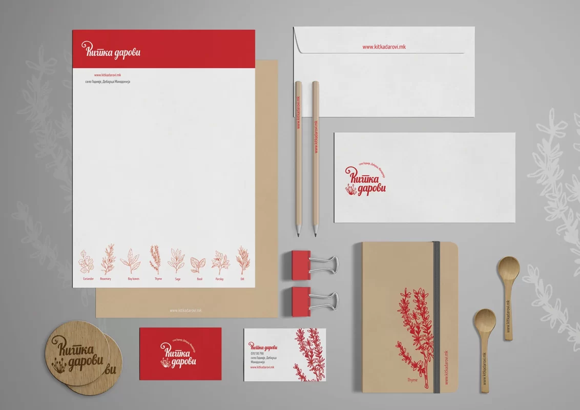 Branded stationery set for 'Китка дарови' featuring letterhead, business cards, envelopes, and herbal illustrations in red and beige.