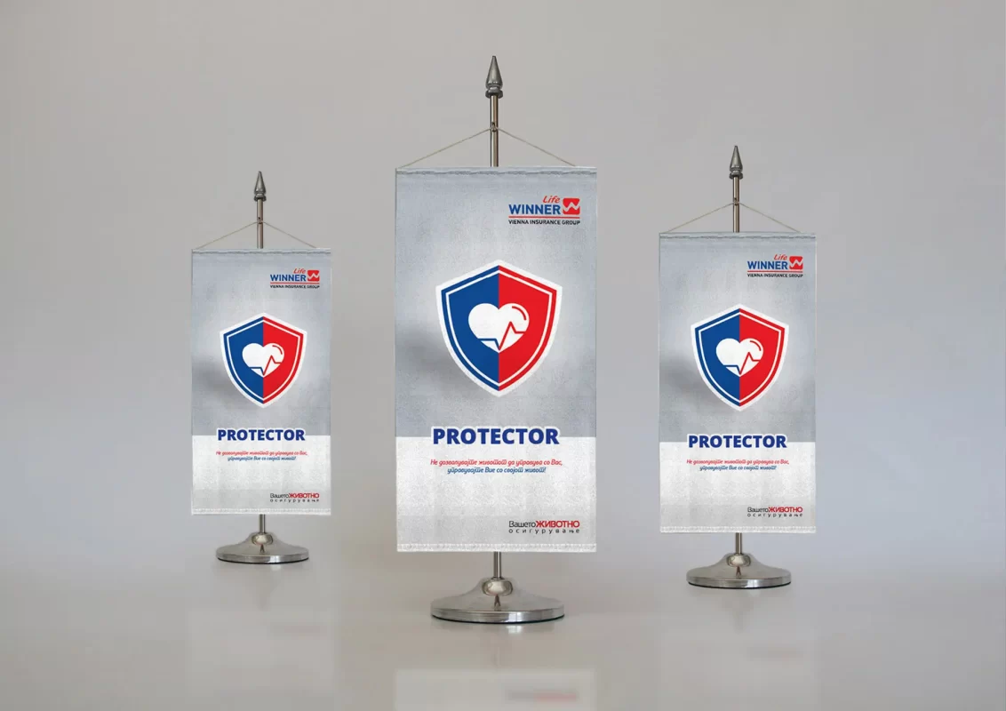 Three standing banners with "PROTECTOR" logos displayed in a row.